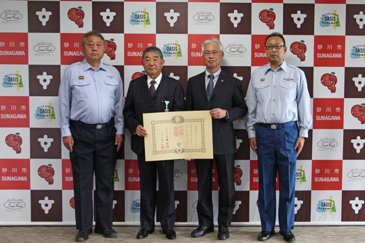 田川正人前砂川消防団長