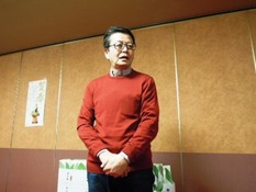 駅前商店会の岩田社長を写した画像